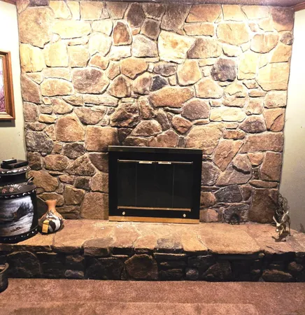 a room with a fireplace