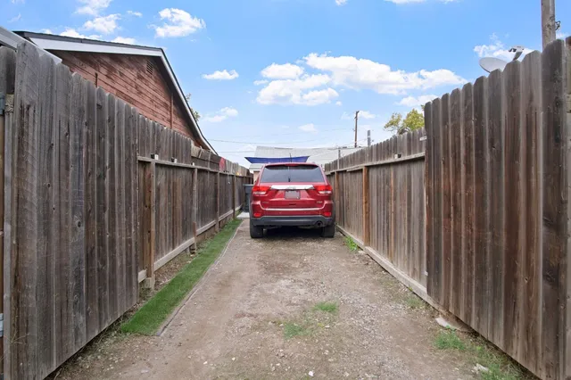 a view of a balcony with furniture
