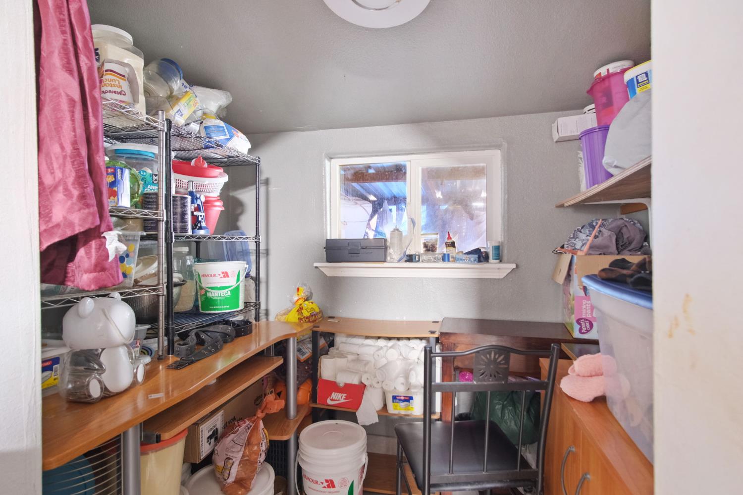 1225 Eugene Avenue Modesto, CA 95351 - Photo 21 of 39 a room with furniture and wooden floor