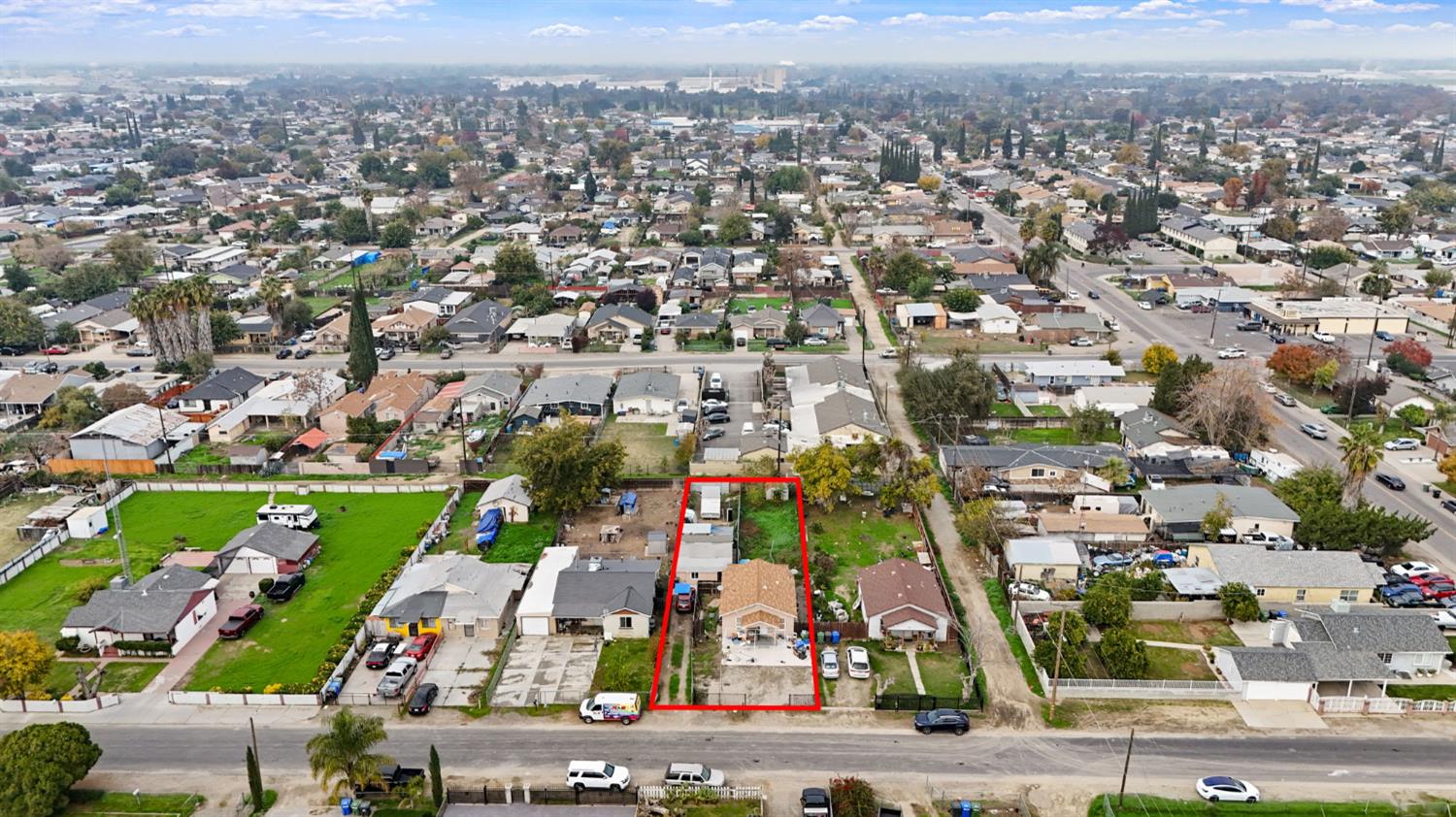 1225 Eugene Avenue Modesto, CA 95351 - Photo 31 of 39 an aerial view of a city with lots of residential buildings