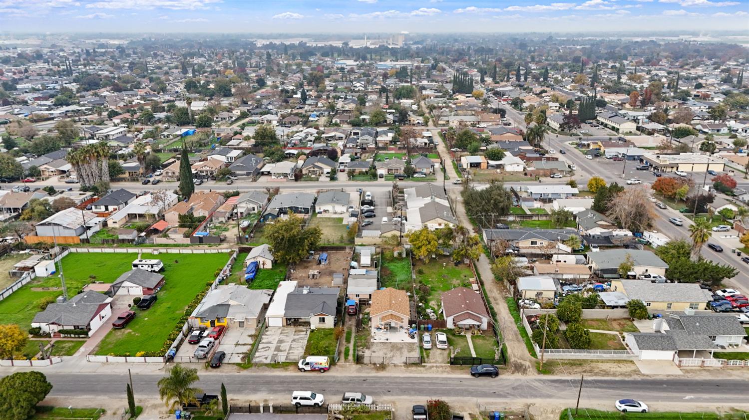1225 Eugene Avenue Modesto, CA 95351 - Photo 36 of 39 an aerial view of a city with lots of residential buildings