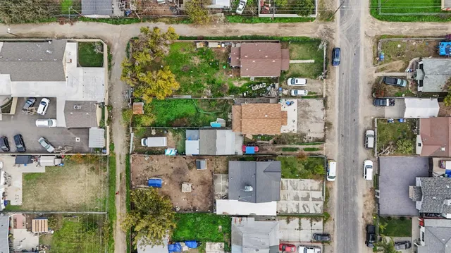 aerial view of a house with a lake view
