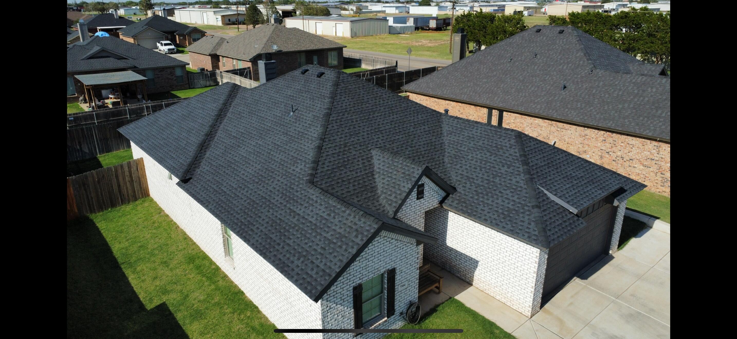 7504 87th Street Lubbock, TX 79424 - Photo 1 of 33 a aerial view of a house with a yard