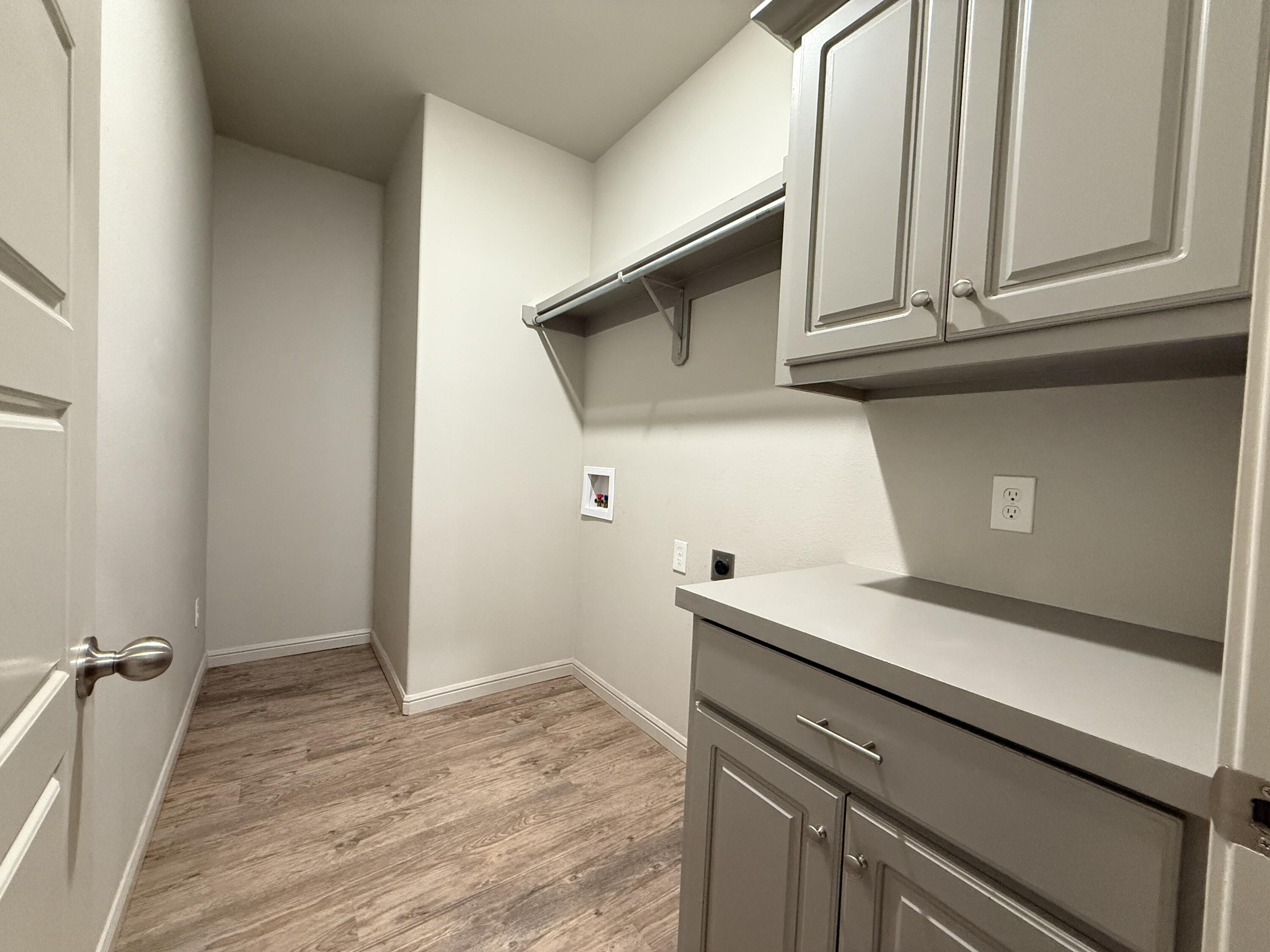 7504 87th Street Lubbock, TX 79424 - Photo 25 of 33 a kitchen with a sink and cabinets