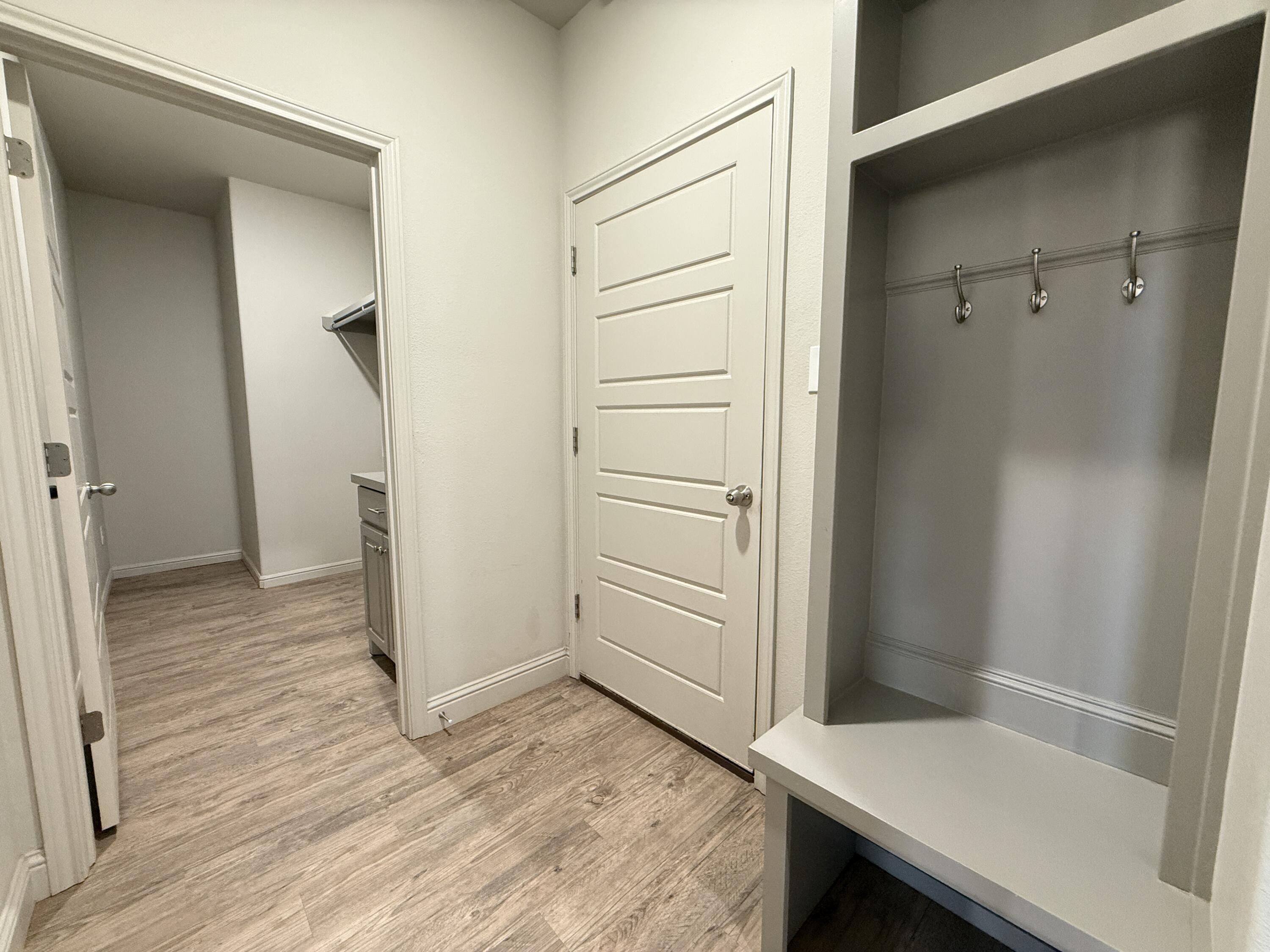 7504 87th Street Lubbock, TX 79424 - Photo 26 of 33 wooden floor in an empty room