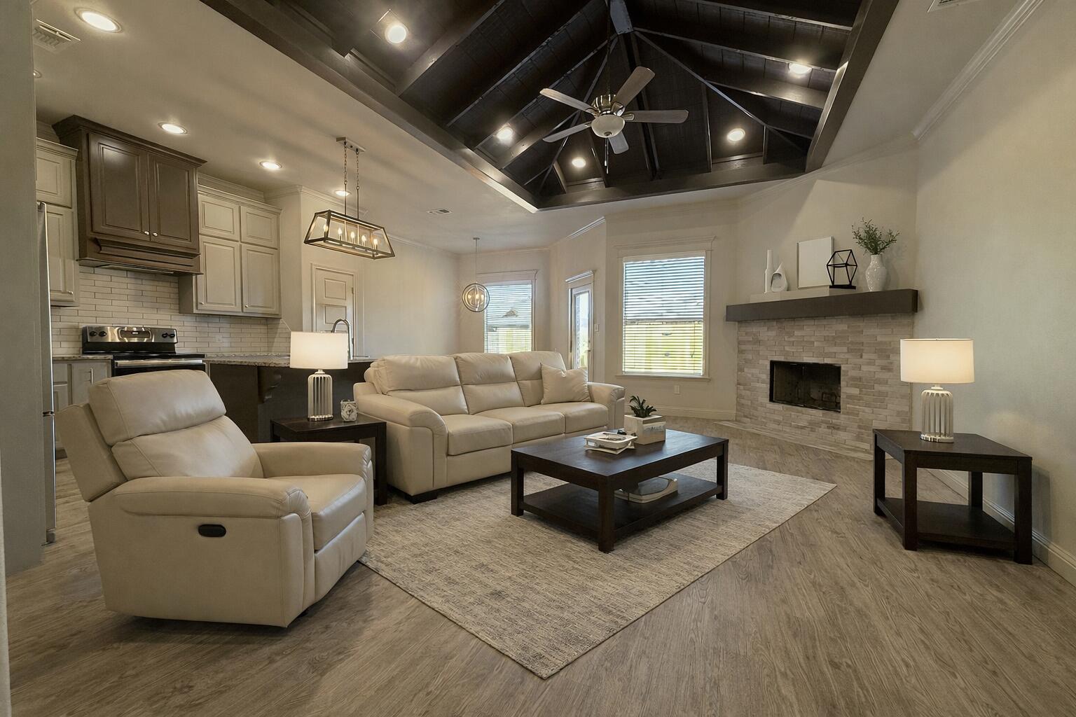7504 87th Street Lubbock, TX 79424 - Photo 3 of 33 a living room with furniture and a fireplace