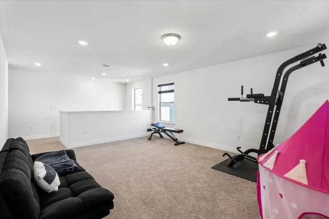 a room with furniture and a window