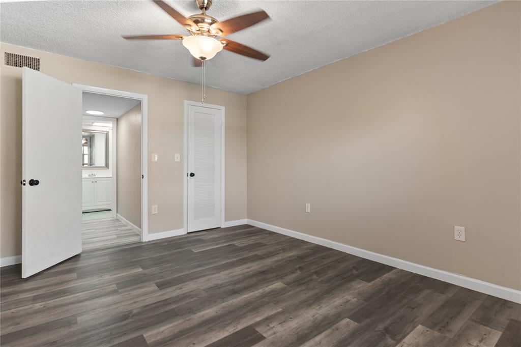 2720 North Pine Island Road, Unit 307 Sunrise, FL 33322 - Photo 36 of 40 wooden floor in an empty room