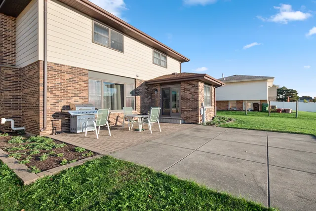 a view of a house with patio