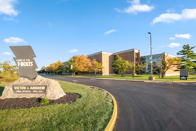 a view of a street with a building in the background