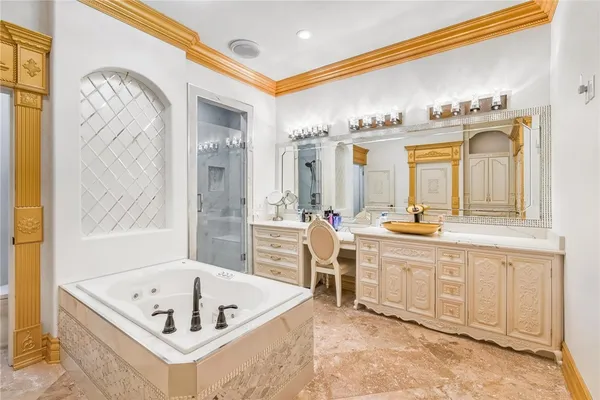 a living room with furniture a large window and wooden floor