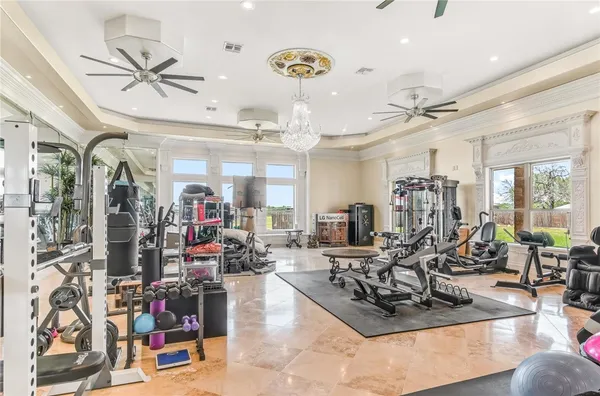 a view of a house with swimming pool and sitting area