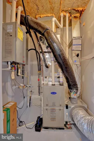 a utility room with washer and dryer