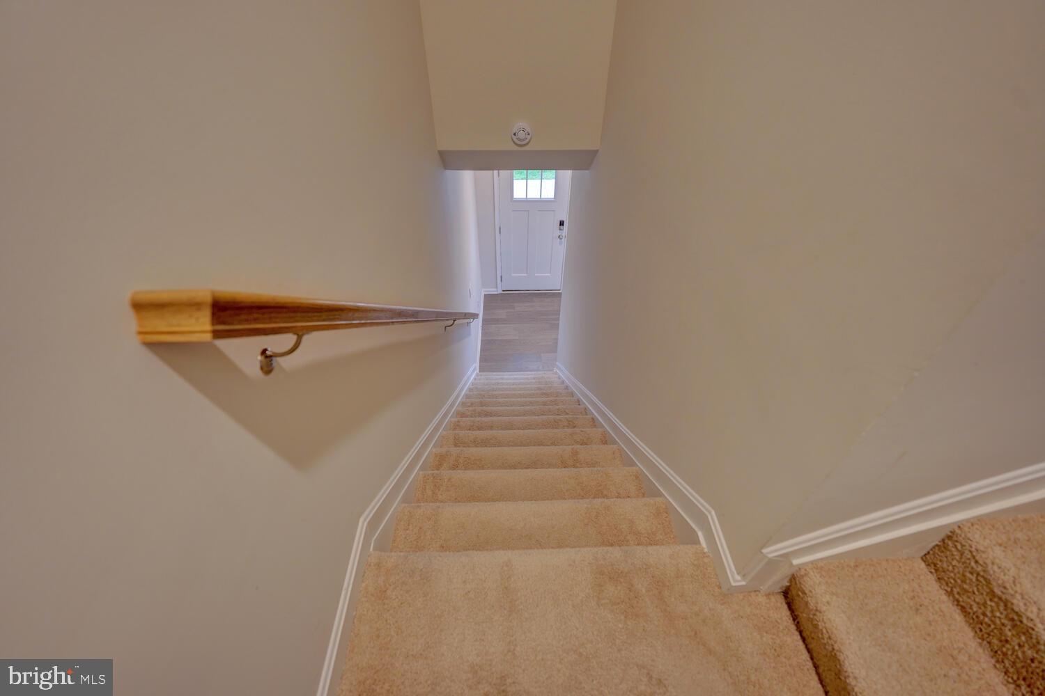 21 Crowberry Drive Magnolia, DE 19962 - Photo 20 of 38 a view of a hallway with wooden floor