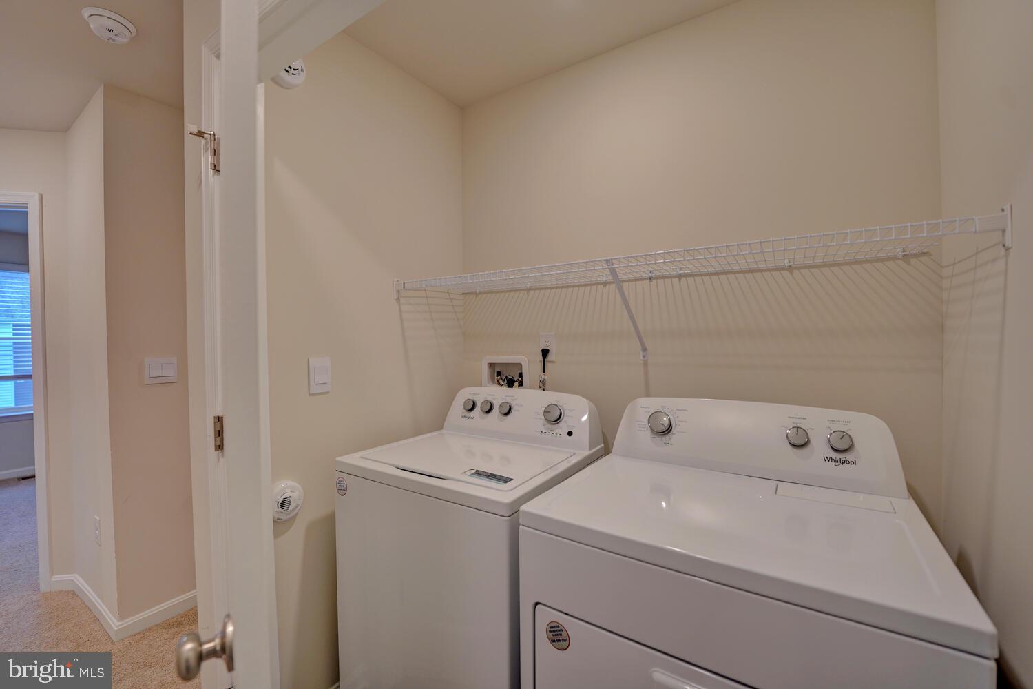 21 Crowberry Drive Magnolia, DE 19962 - Photo 23 of 38 a utility room with dryer and washer