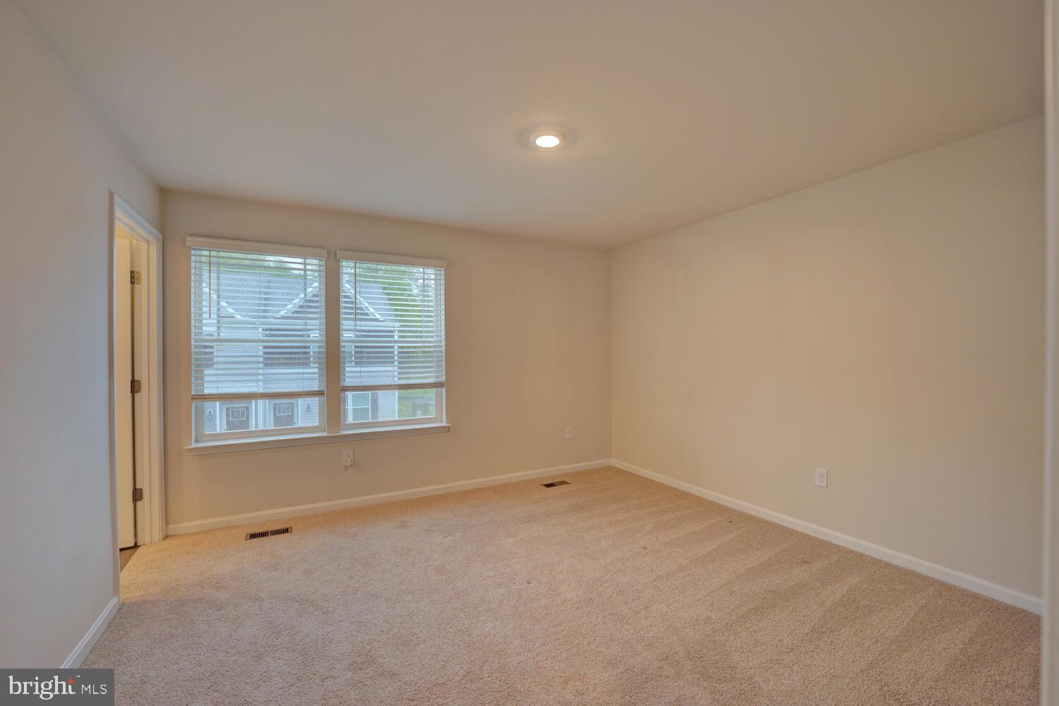 21 Crowberry Drive Magnolia, DE 19962 - Photo 24 of 38 an empty room with a window