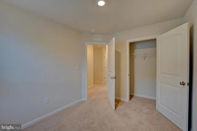 wooden floor and closet in a room