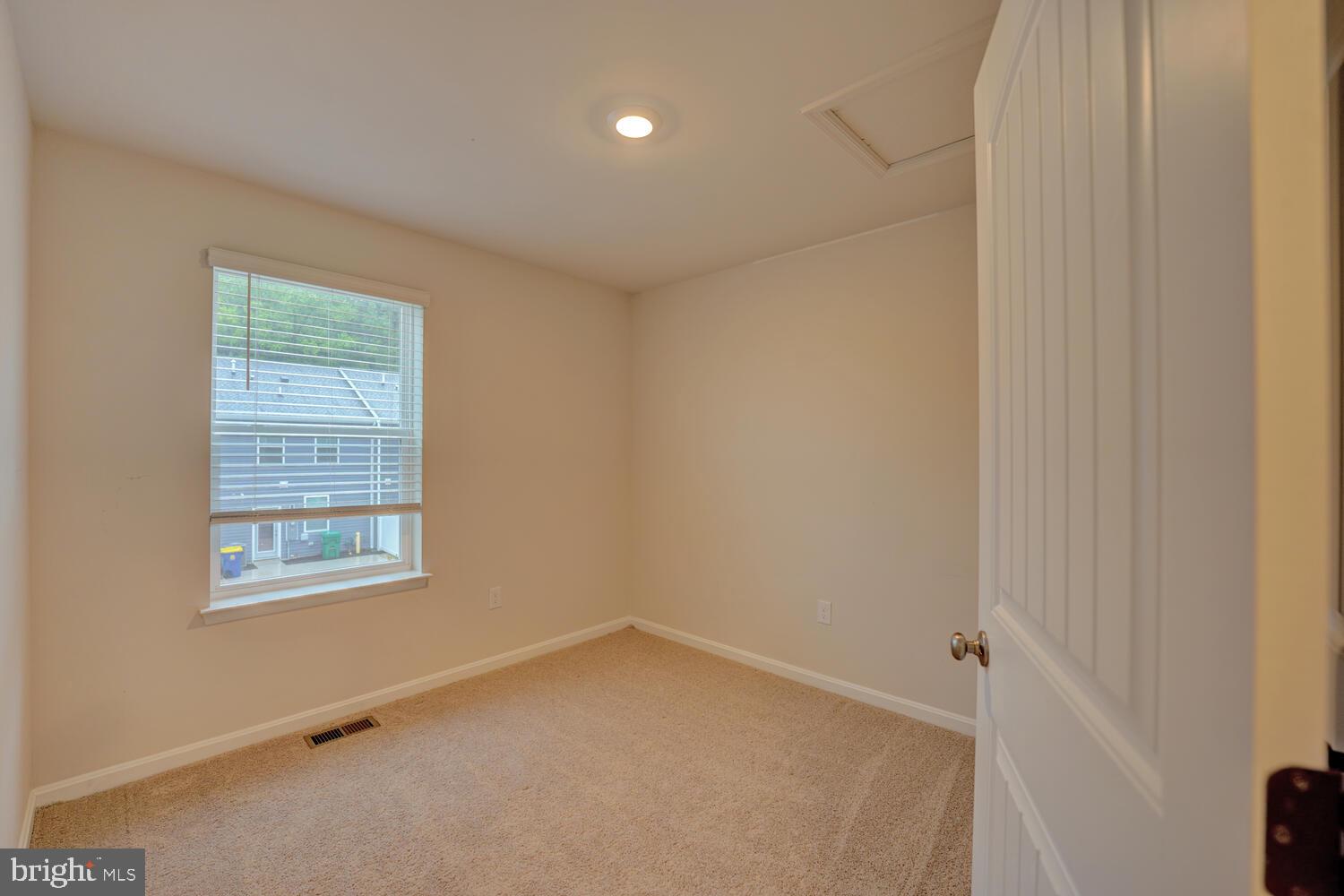 21 Crowberry Drive Magnolia, DE 19962 - Photo 33 of 38 a view of an empty room with a window