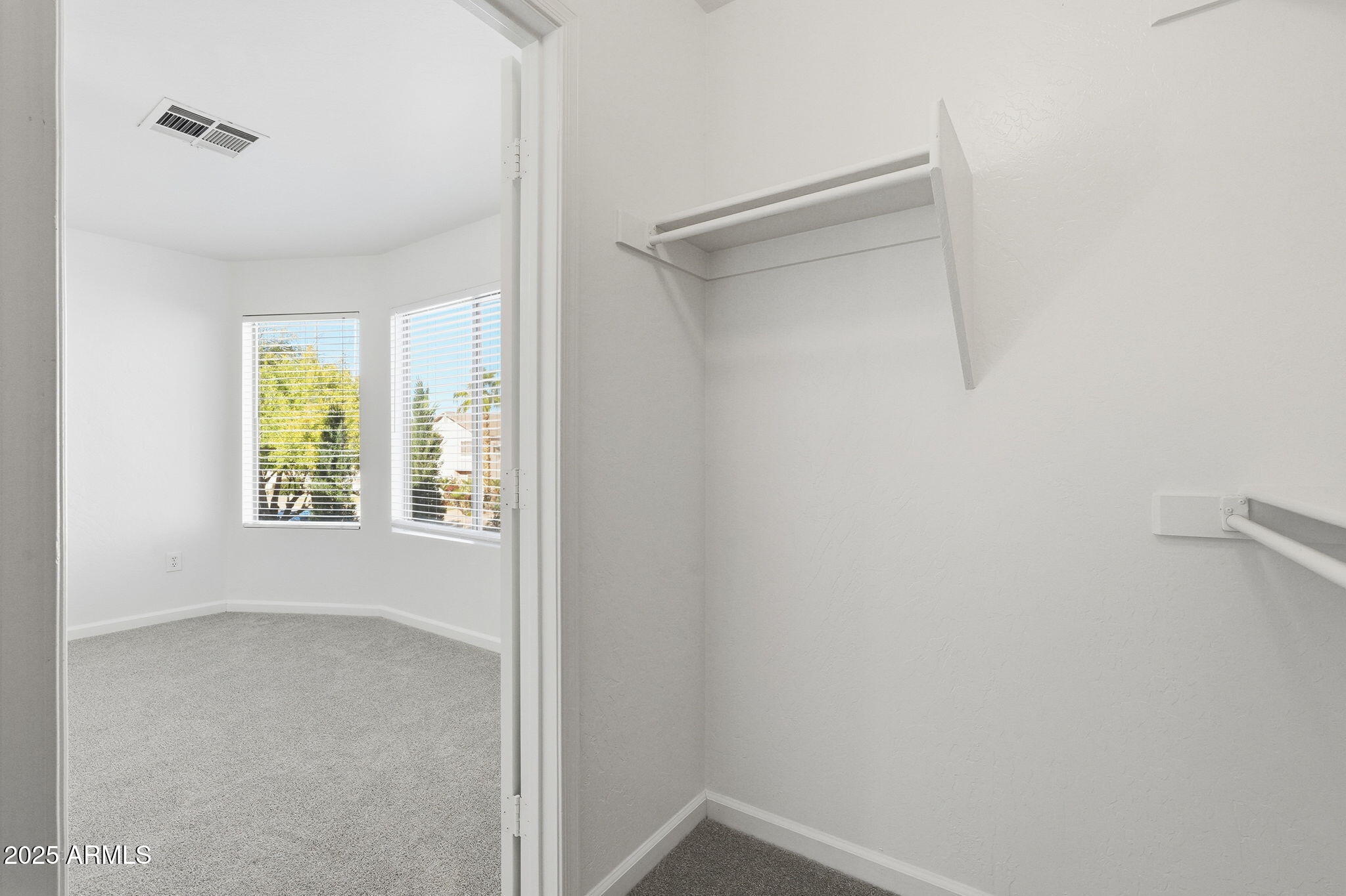 2061 East Appaloosa Road Gilbert, AZ 85296 - Photo 24 of 37 a view of an empty room with a window