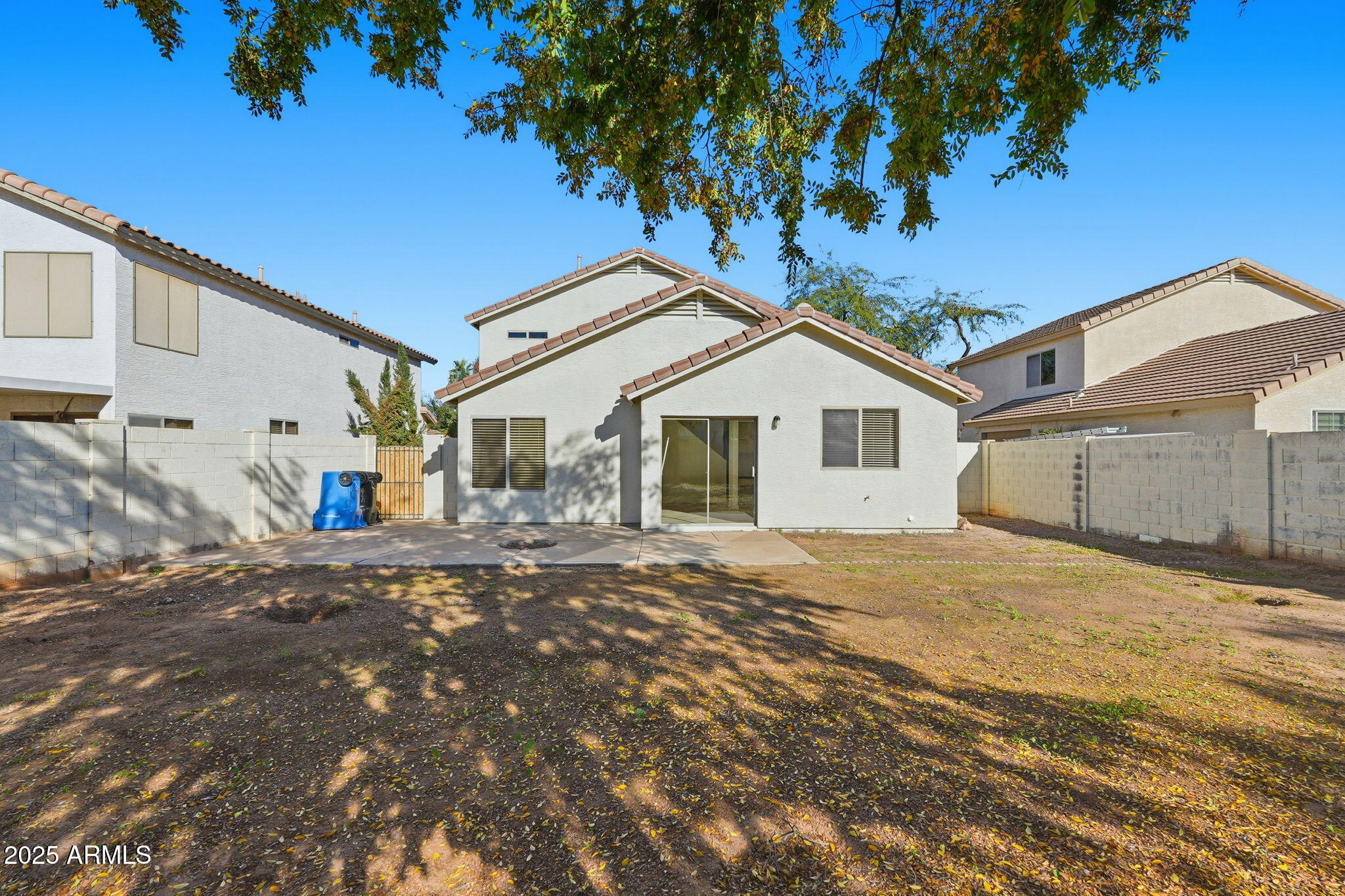2061 East Appaloosa Road Gilbert, AZ 85296 - Photo 34 of 37 a view of a house with a backyard