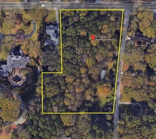 a view of a yard covered in snow