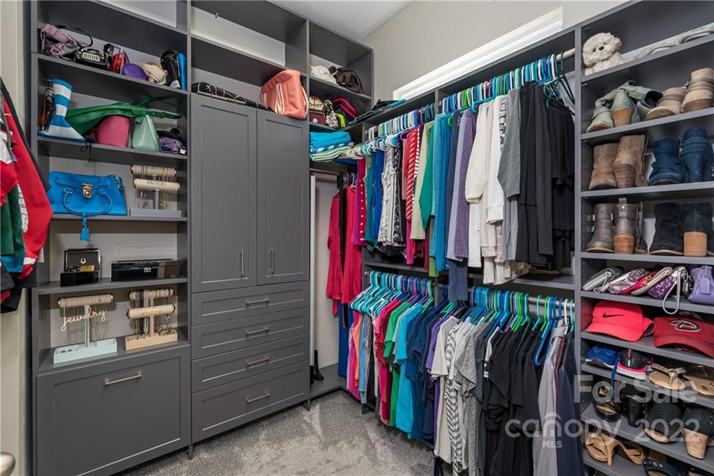 1235 Gold Rush Court Fort Mill, SC 29708 - Photo 25 of 42 a view of walk in closet with clothes and shoes