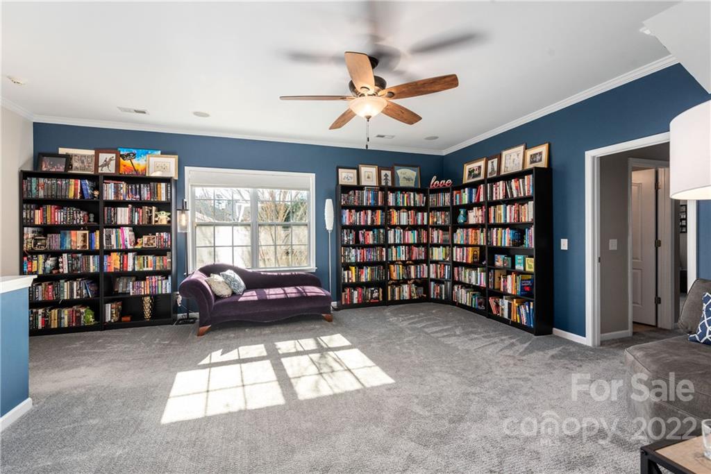 1235 Gold Rush Court Fort Mill, SC 29708 - Photo 29 of 42 a view of livingroom with furniture and book shelf