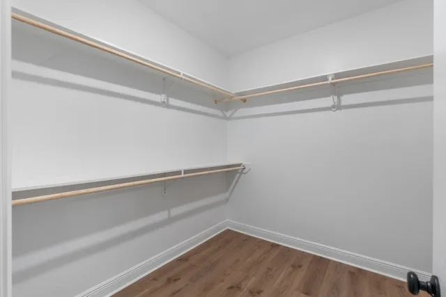 a view of an empty walk in closet