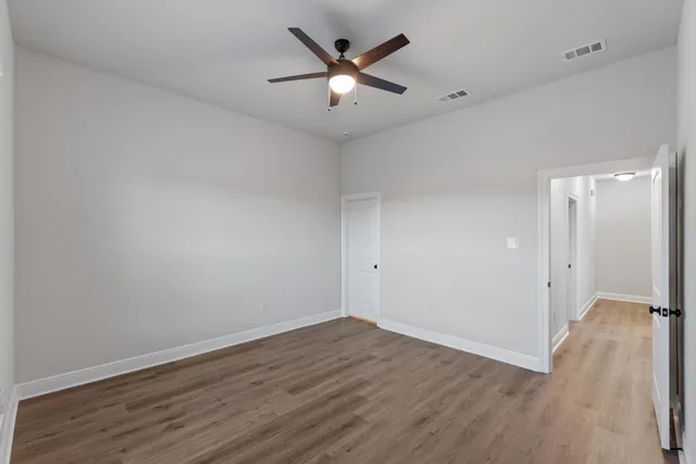 a view of an empty walk in closet