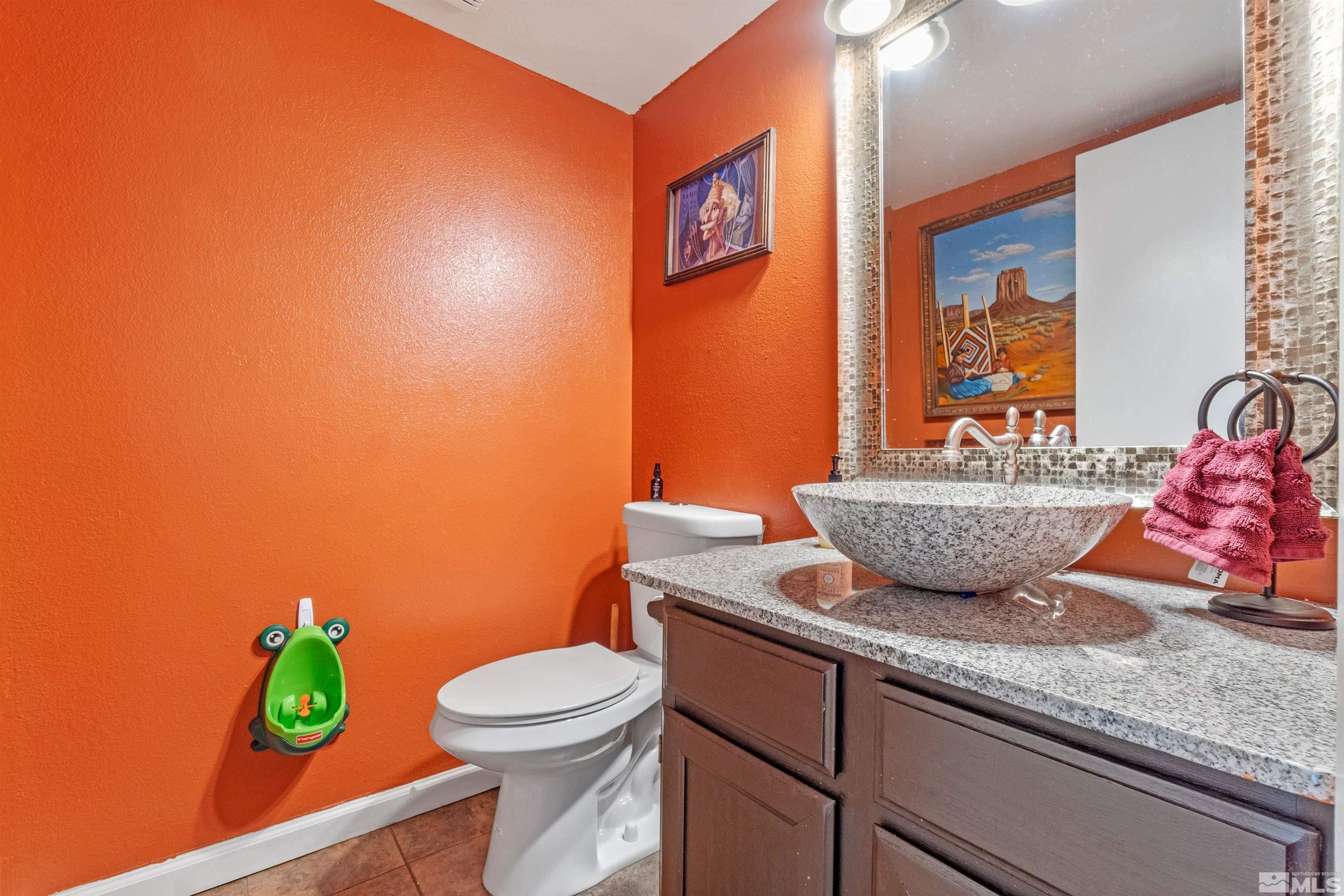 3971 Kings Row Reno, NV 89503 - Photo 20 of 29 a bathroom with a toilet a sink and tub