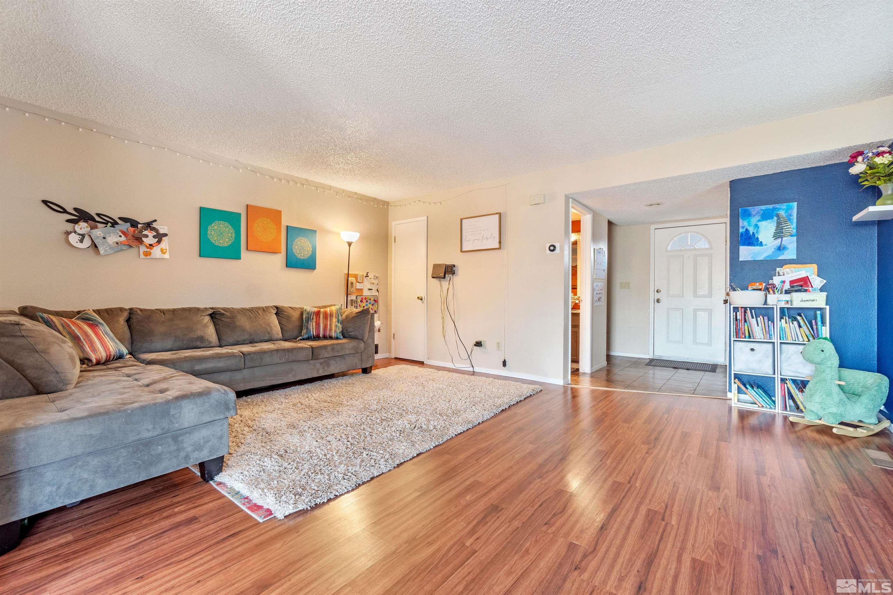 3971 Kings Row Reno, NV 89503 - Photo 7 of 29 a living room with furniture and wooden floor