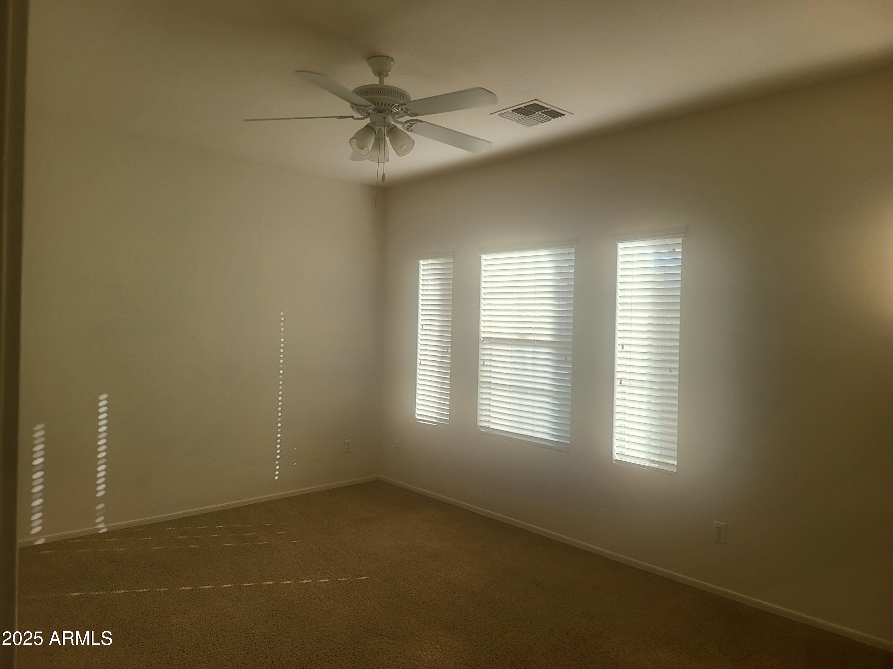 1388 East Boston Street Gilbert, AZ 85295 - Photo 13 of 13 a view of an empty room with a window