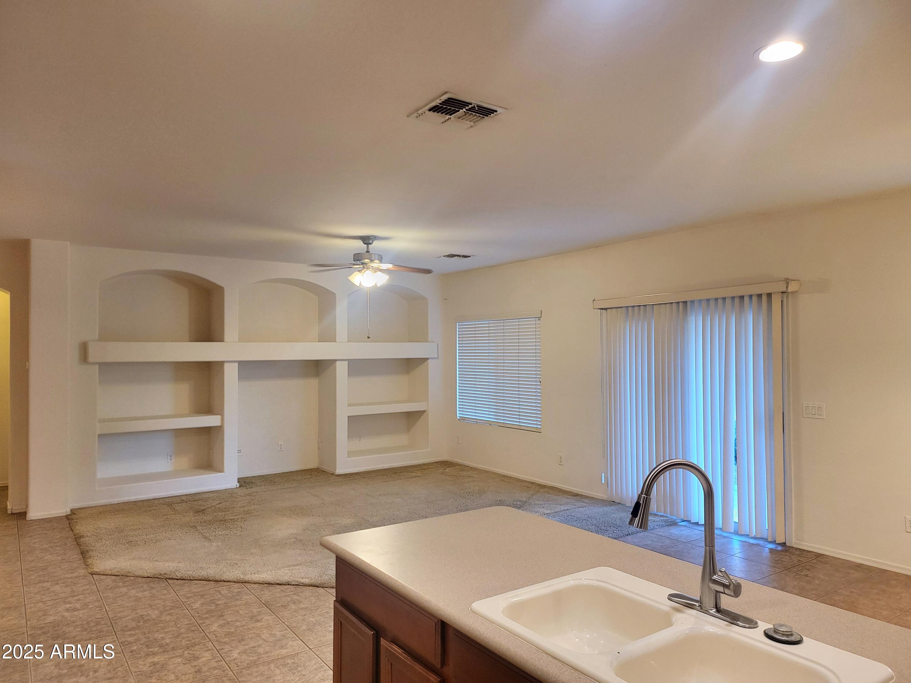 1388 East Boston Street Gilbert, AZ 85295 - Photo 6 of 13 a room with a workspace