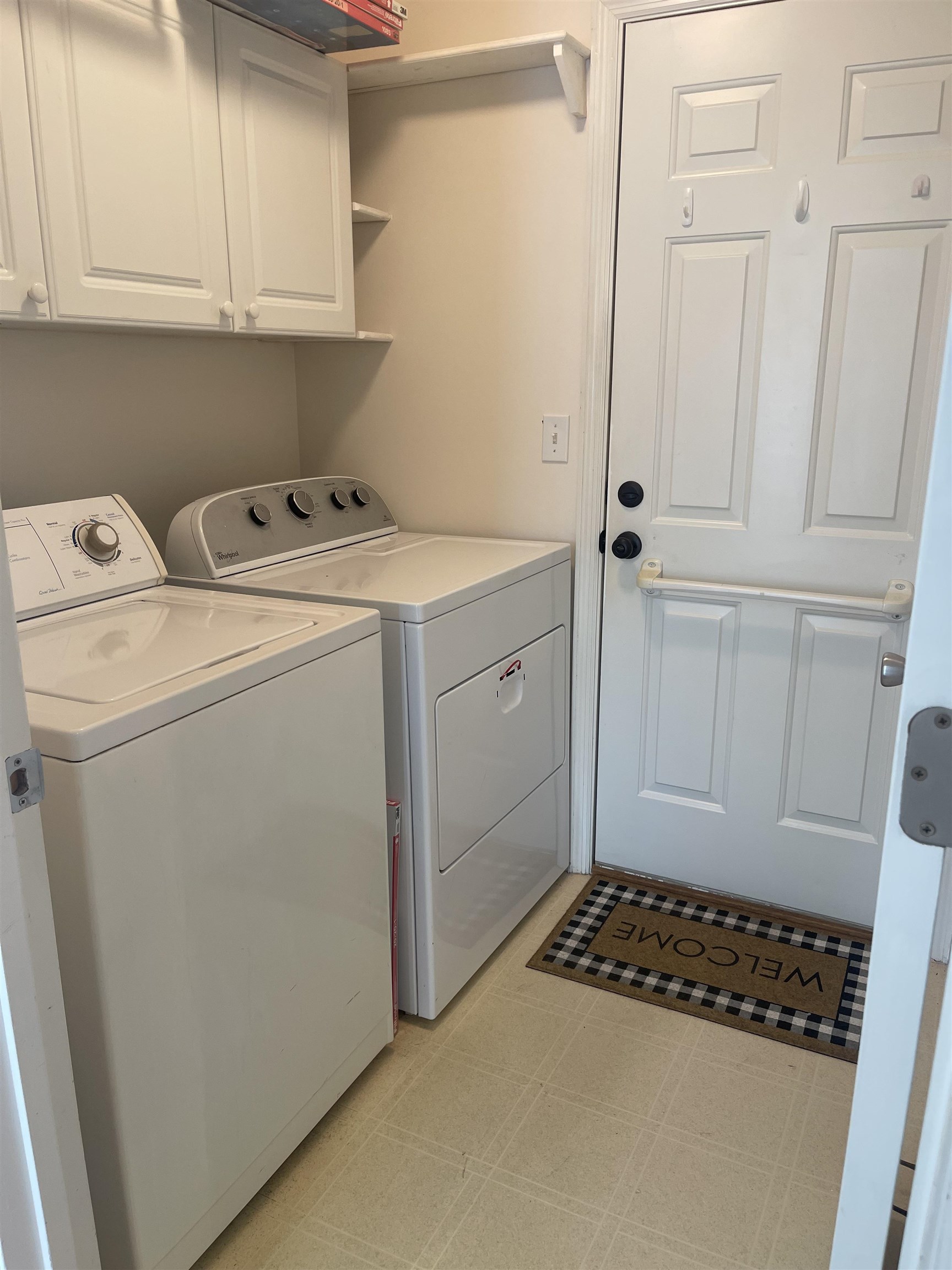 1113 Compass Row St. Augustine, FL 32080 - Photo 22 of 29 a view of storage and utility room with washer and dryer