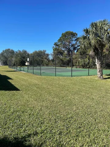 a view of a house with a garden
