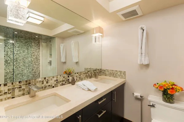 a view of a balcony with wooden floor