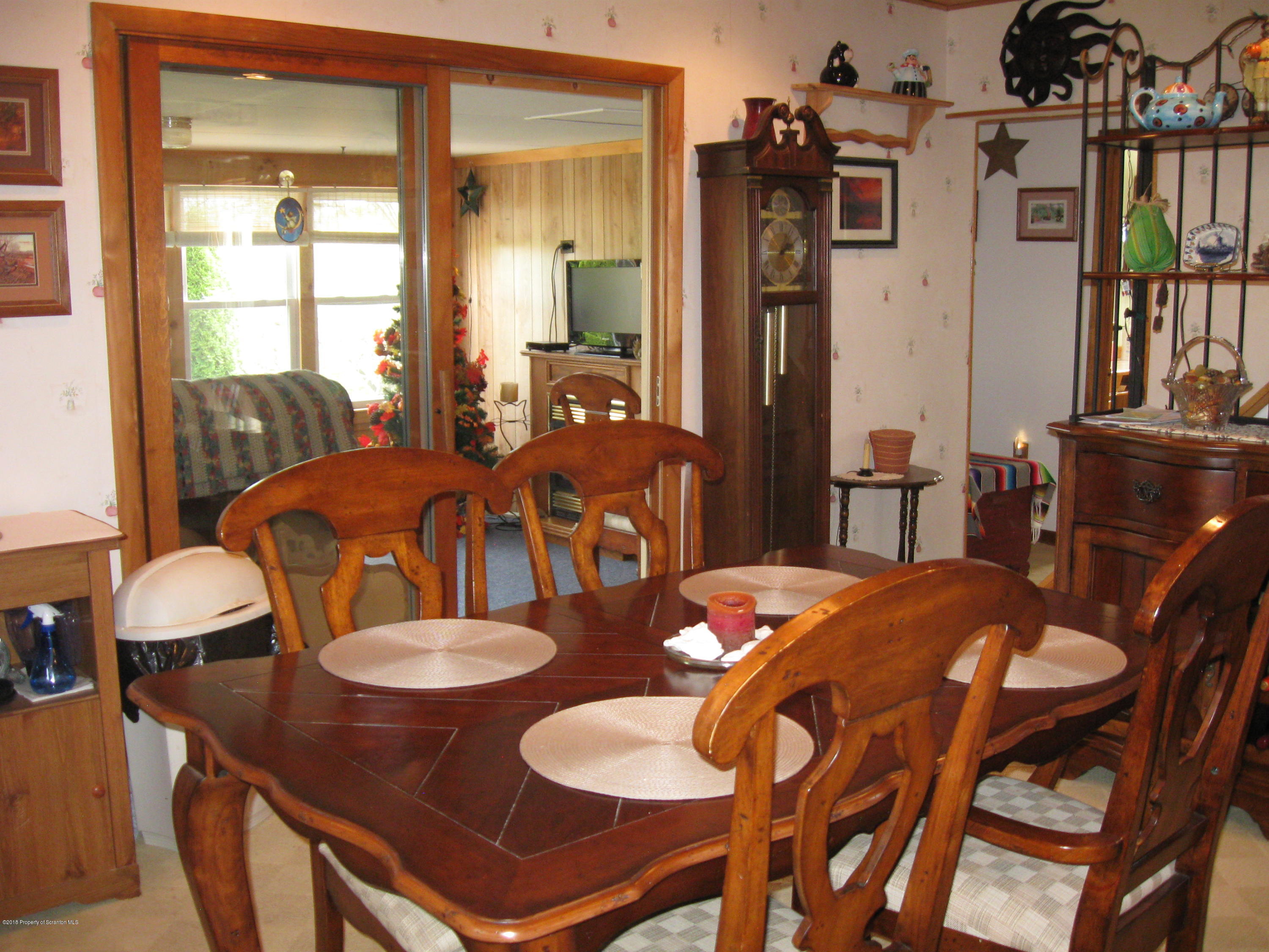 2744 State Rte 3013 Springville, PA 18844 - Photo 14 of 46 a view of a dining room with furniture