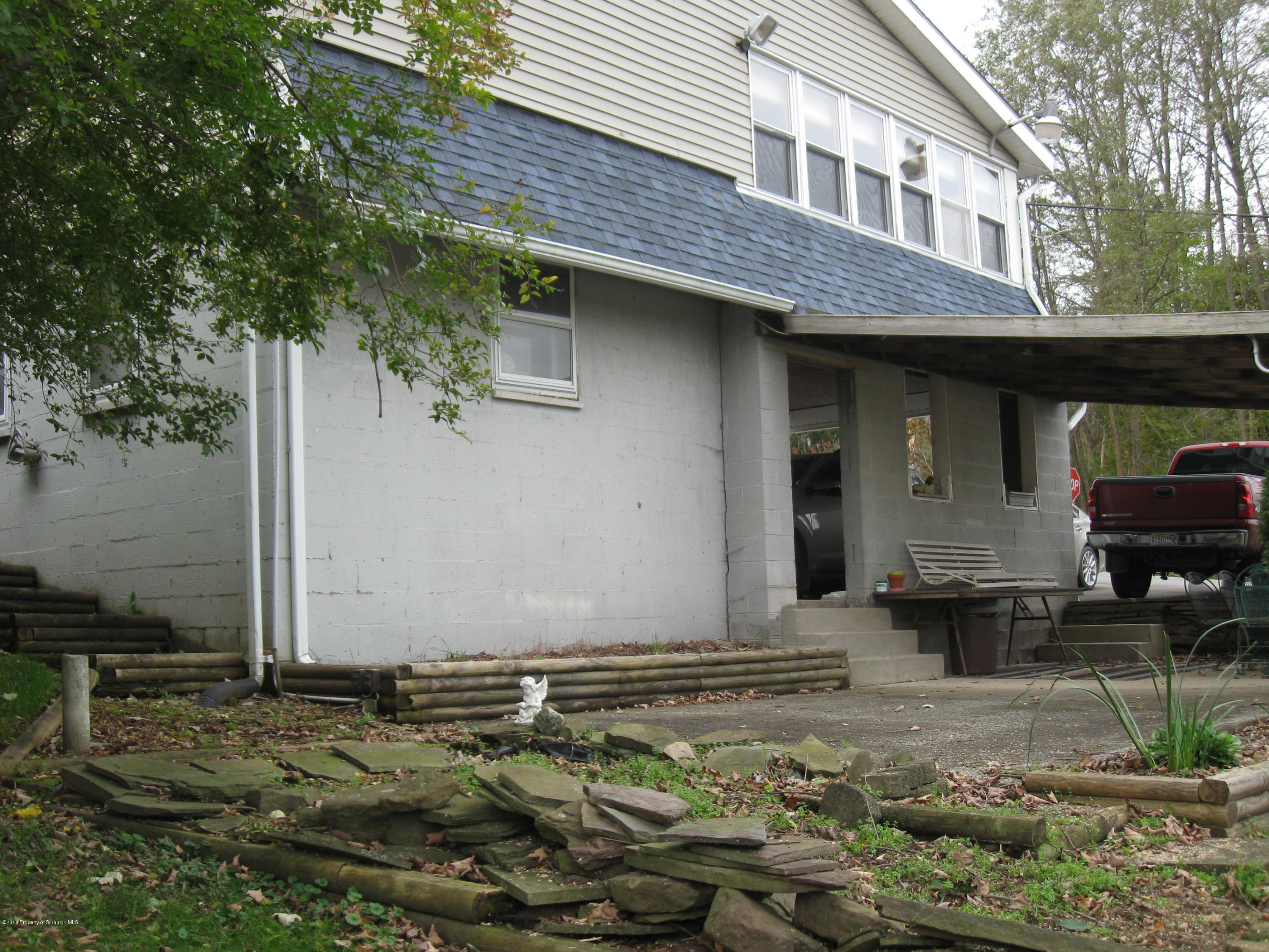 2744 State Rte 3013 Springville, PA 18844 - Photo 40 of 46 a backyard of a house with barbeque oven