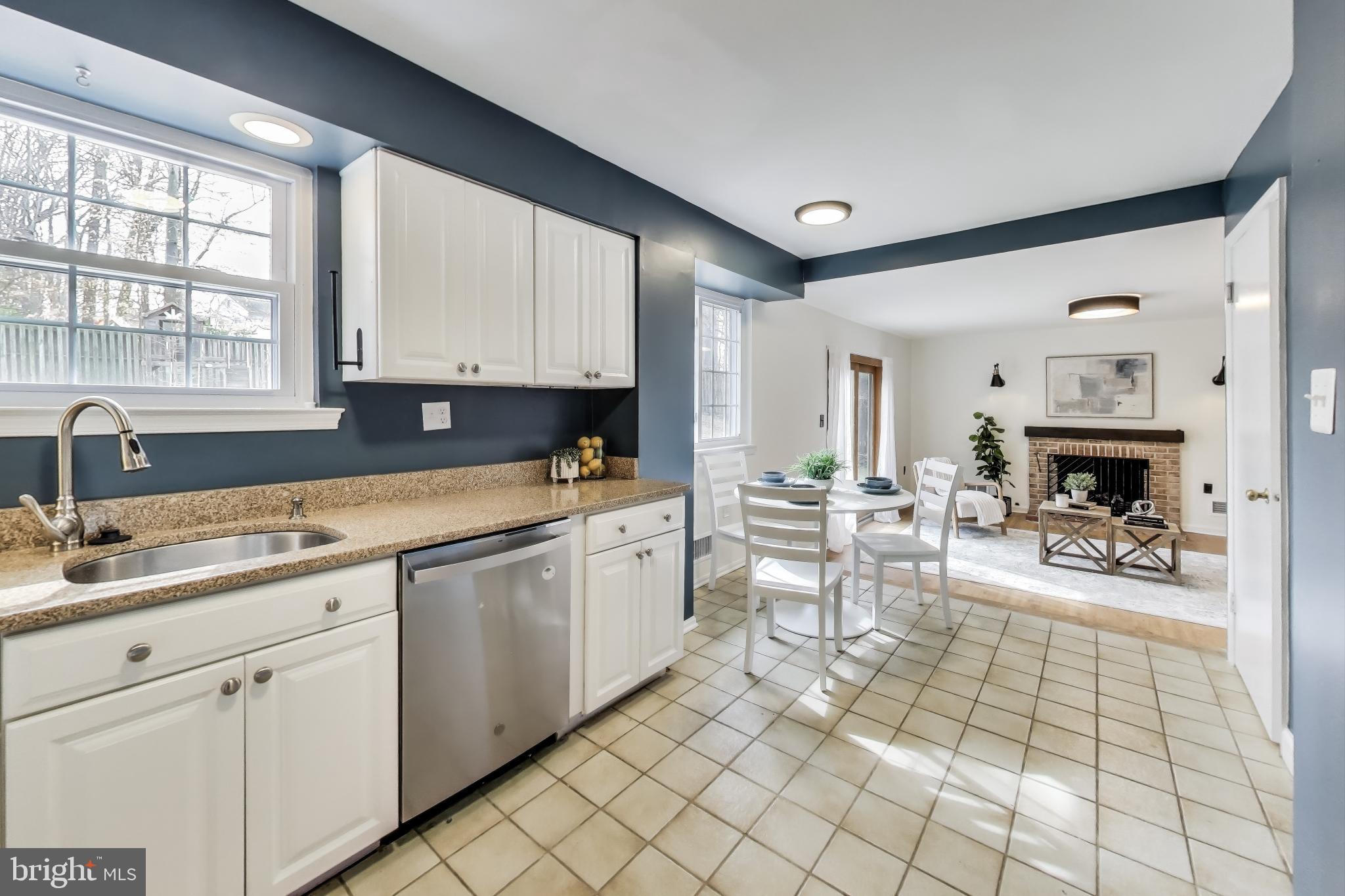 9023 Brook Ford Road Burke, VA 22015 - Photo 11 of 43 a kitchen with a sink and cabinets