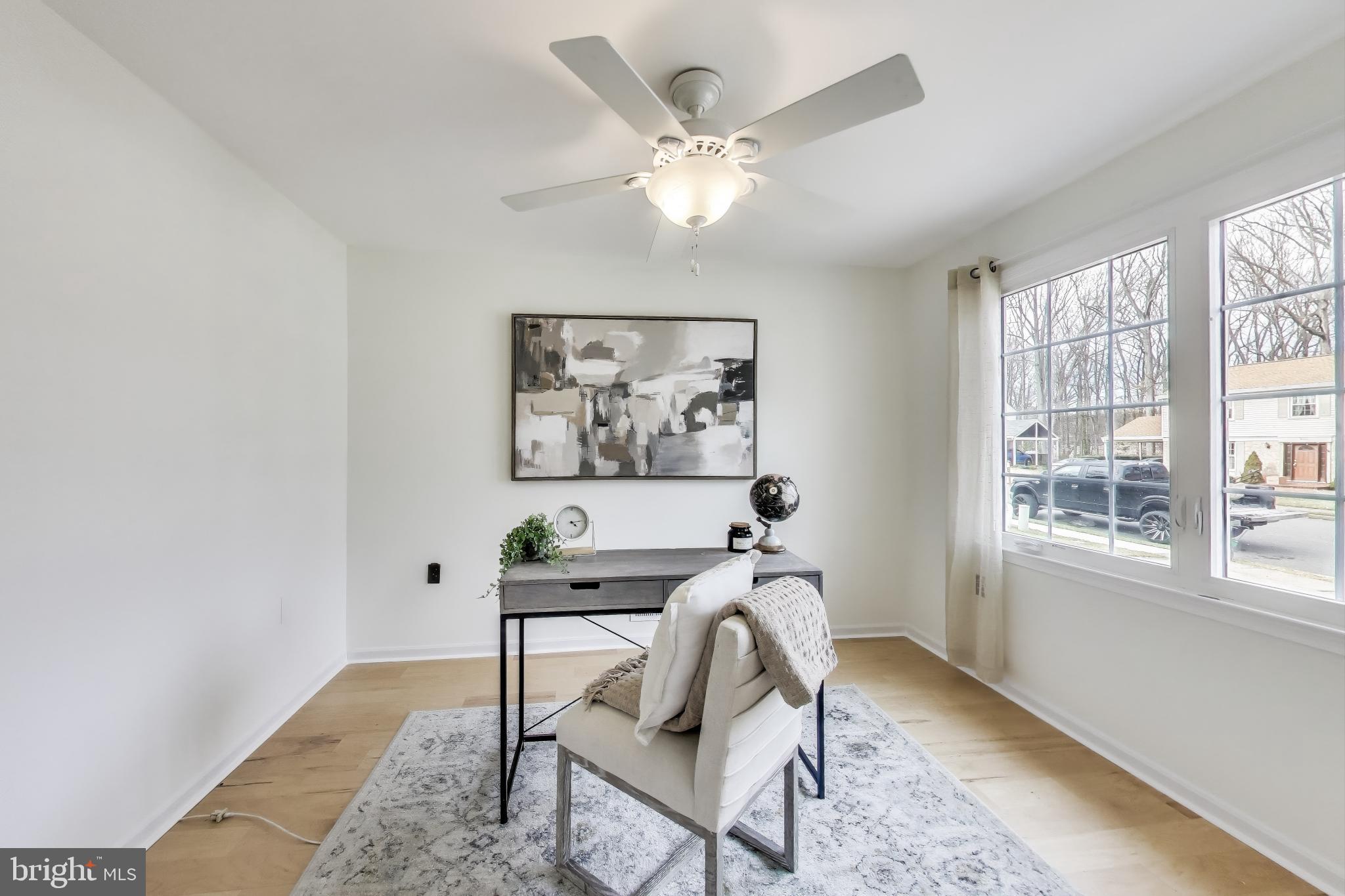 9023 Brook Ford Road Burke, VA 22015 - Photo 16 of 43 a living room with furniture and a window