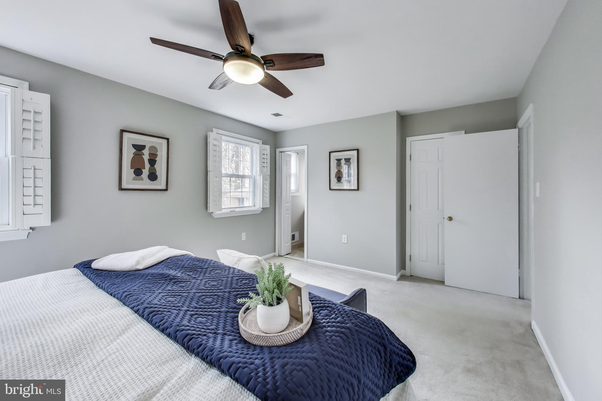 9023 Brook Ford Road Burke, VA 22015 - Photo 21 of 43 a living room with furniture and a wooden floor