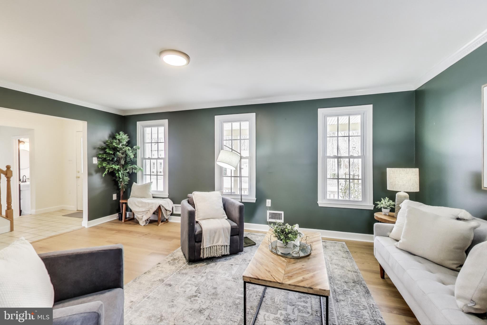 9023 Brook Ford Road Burke, VA 22015 - Photo 3 of 43 a living room with furniture and a large window