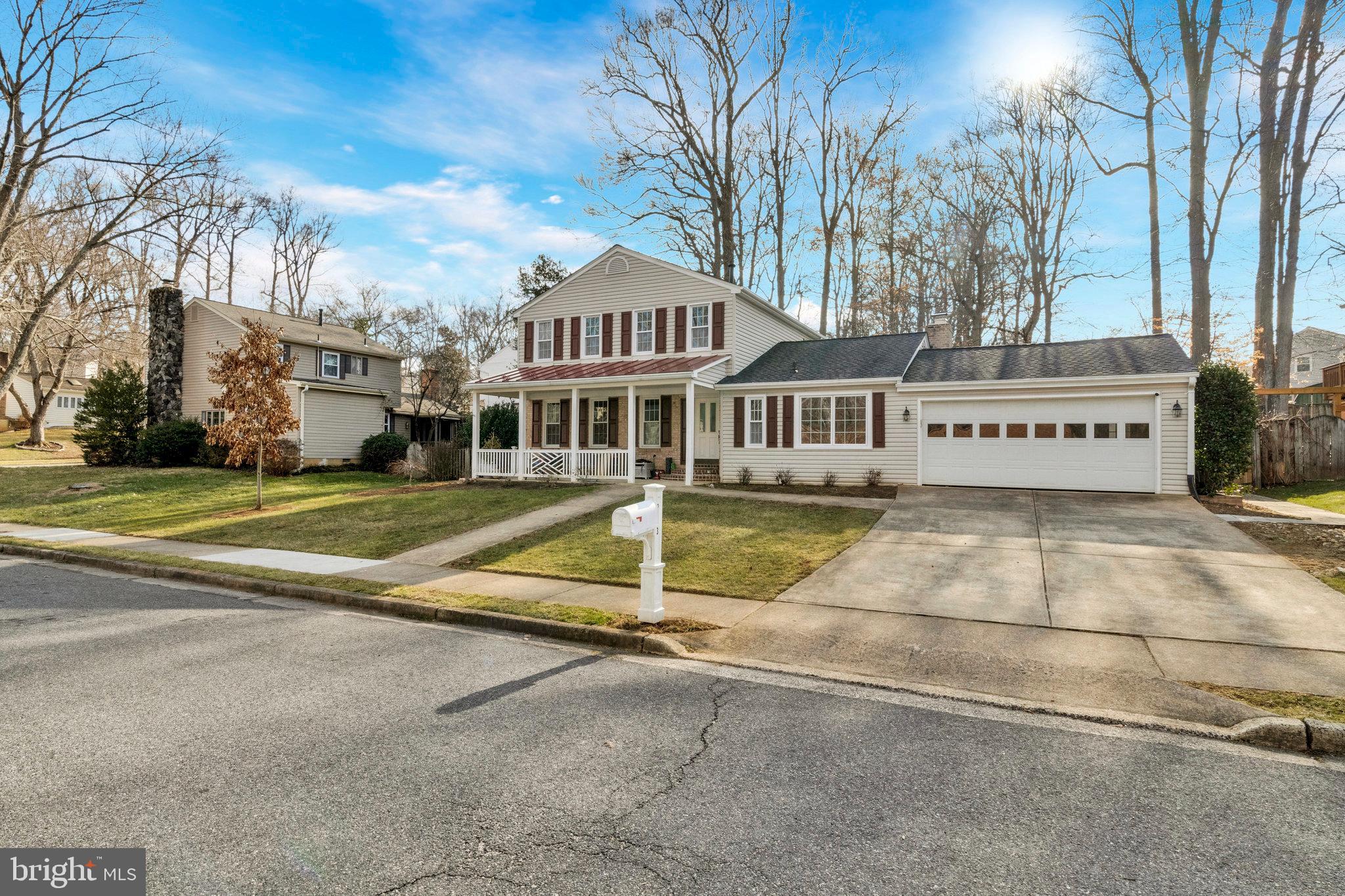 9023 Brook Ford Road Burke, VA 22015 - Photo 35 of 43 a view of a house with a swimming pool