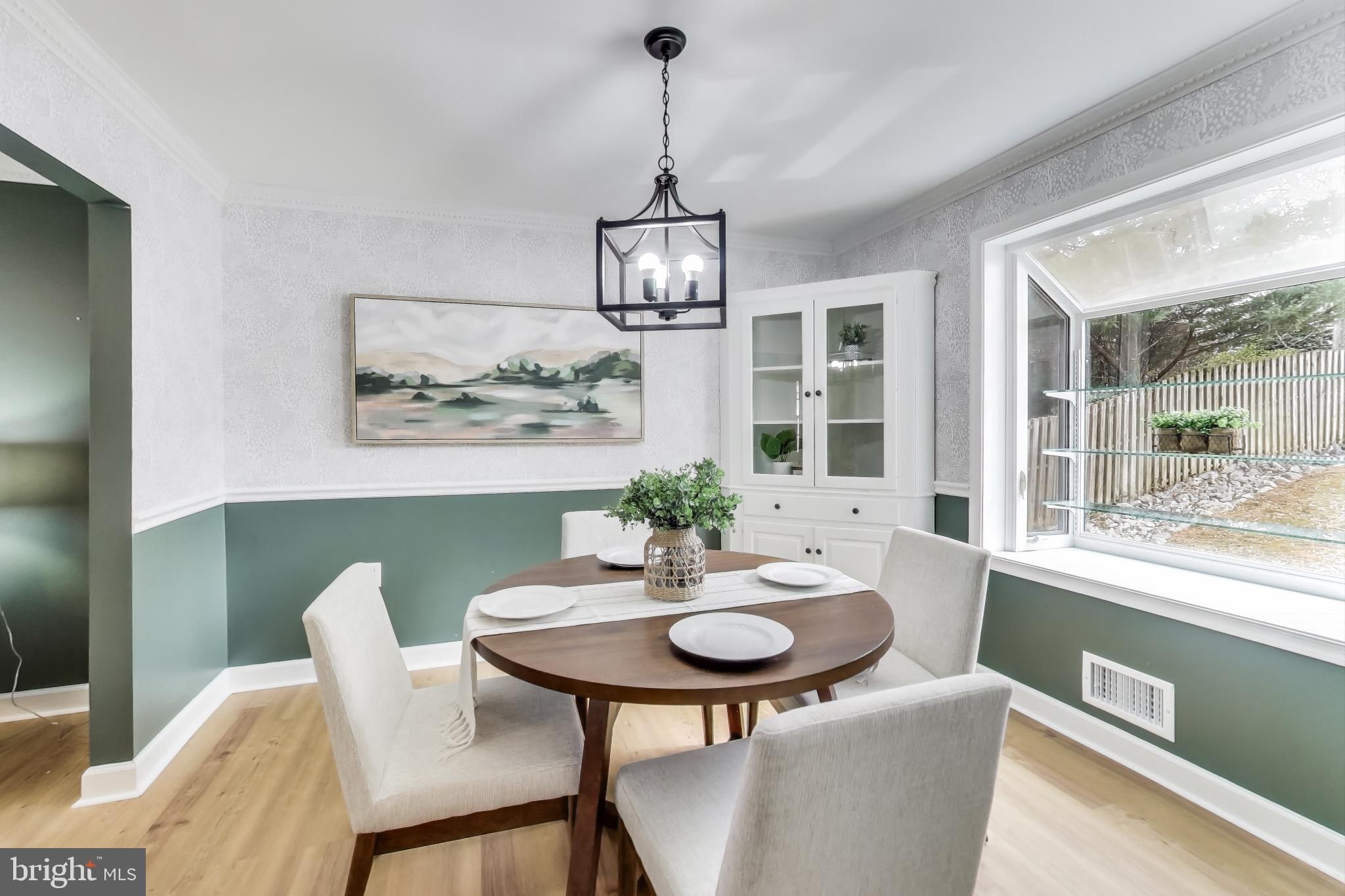 9023 Brook Ford Road Burke, VA 22015 - Photo 5 of 43 a view of a dining room with furniture window and outside view
