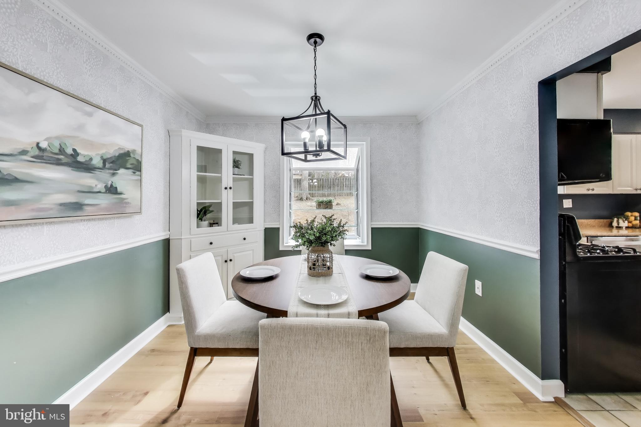 9023 Brook Ford Road Burke, VA 22015 - Photo 6 of 43 a view of a dining room with furniture window and outside view