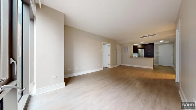 a view of a livingroom with a staircase