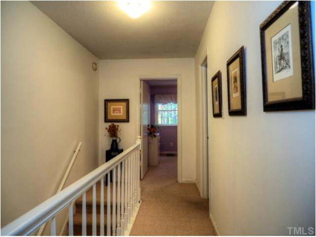 6375 New Market Way Raleigh, NC 27615 - Photo 17 of 20 a view of a hallway with a elevator