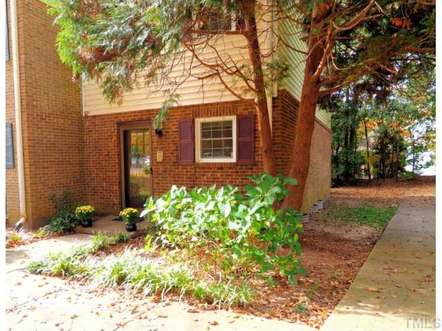 6375 New Market Way Raleigh, NC 27615 - Photo 2 of 20 a front view of a house with garden
