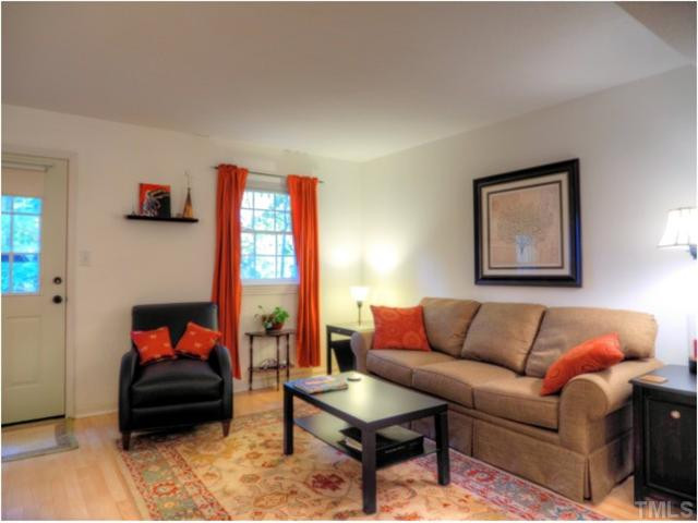 6375 New Market Way Raleigh, NC 27615 - Photo 9 of 20 a living room with furniture and a couch