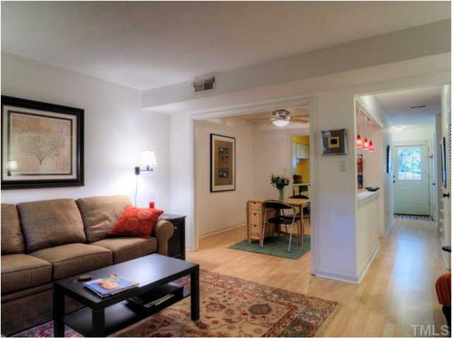 6375 New Market Way Raleigh, NC 27615 - Photo 10 of 20 a living room with furniture and wooden floor